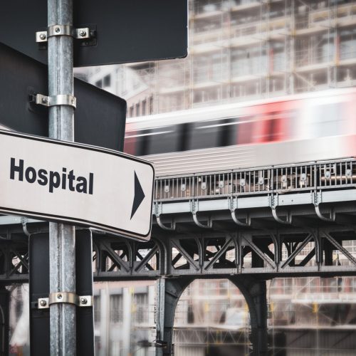 Street Sign the Direction Way to Hospital